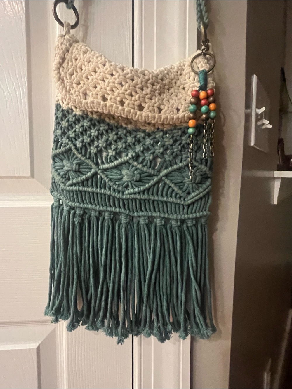 The Sak Macramé Fringe Shoulder Bag in Teal and Cream